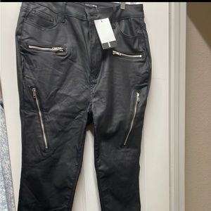 Black faux leather skinny pants